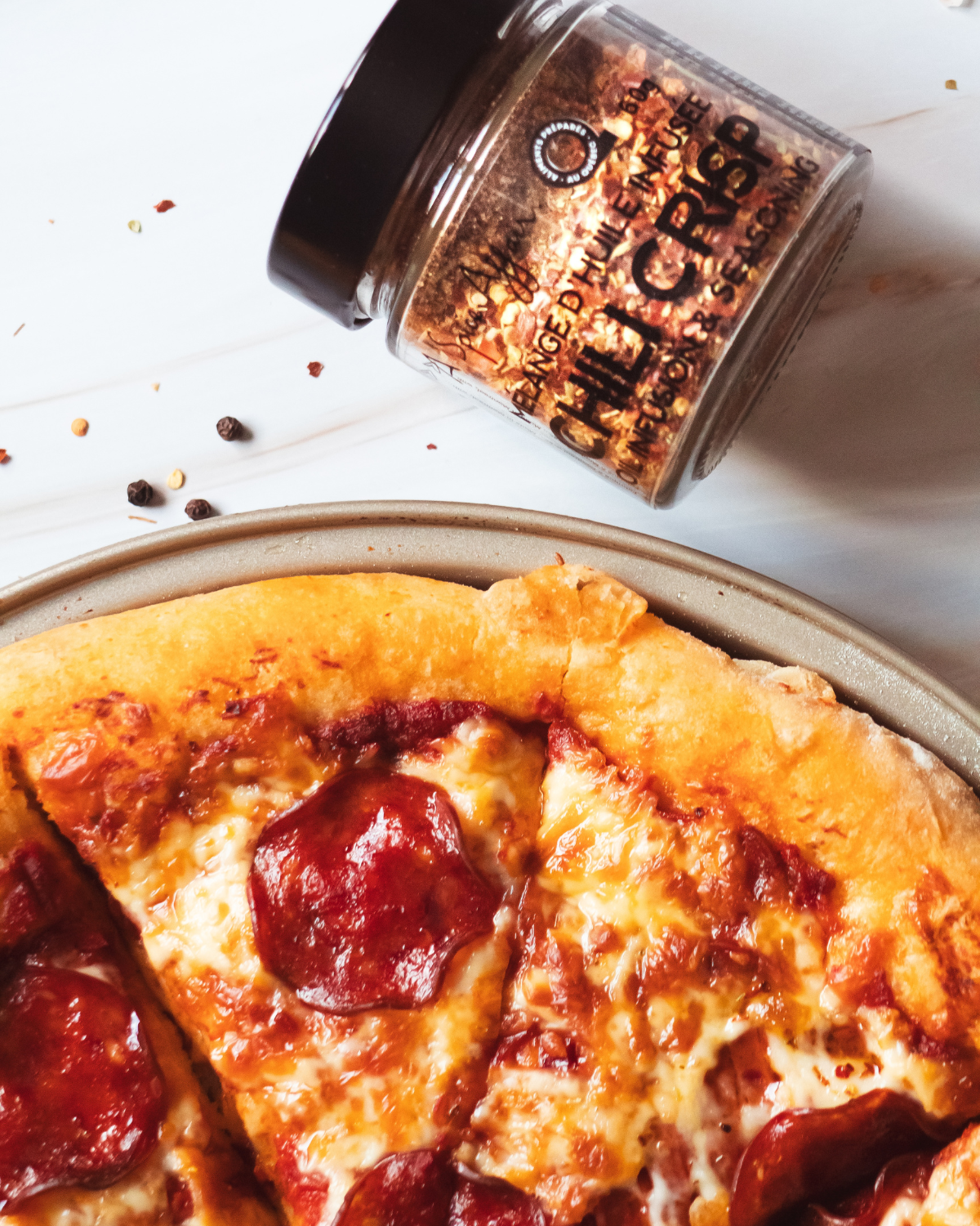 https://aspiceaffair.com/cdn/shop/articles/CHILI_CRISP_OIL_PEPPERONI_PIZZA_363a8f0c-1f60-4320-b6b8-dfcf5a1ca4c5.png?v=1721734690&utm_source=chatgpt.com